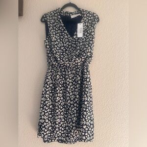 ELIZABETH CROSBY Elegant Black and White Heart Midi Dress